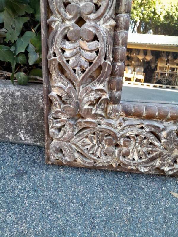 A Pair of Heavily Carved Ornate Floral Mirrors in A Distressed Contemporary Finish