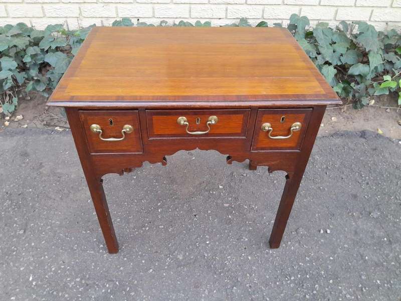 An 18th/ 19th Century Georgian Oak and Mahogany Lowboy with Drawers and Brass Handles