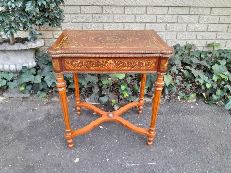 A 20th Century French Style Walnut and Gilt Metal  Games Table with Tooled Leather Top