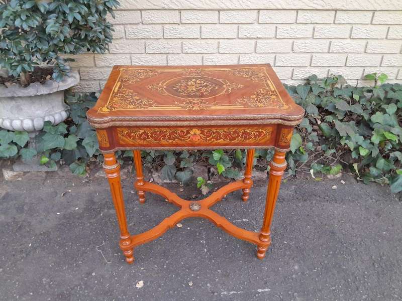 A 20th Century French Style Walnut and Gilt Metal  Games Table with Tooled Leather Top