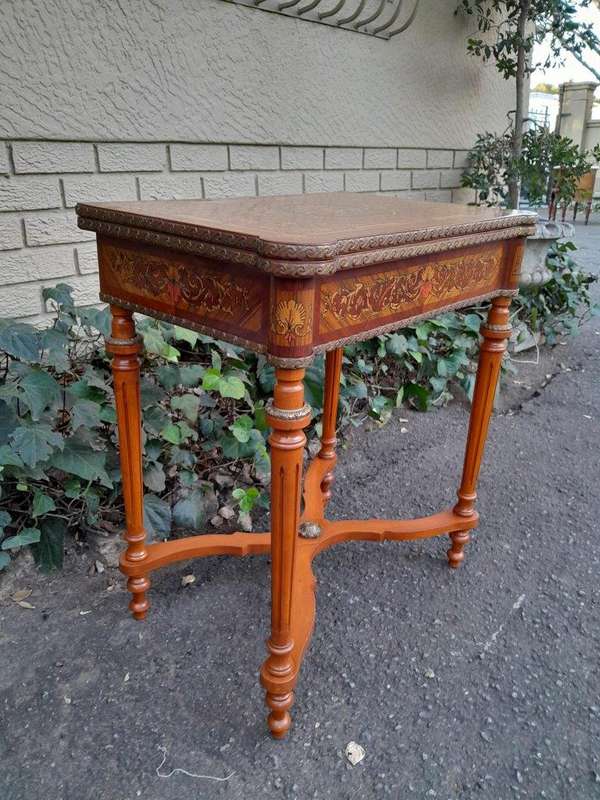 A 20th Century French Style Walnut and Gilt Metal  Games Table with Tooled Leather Top