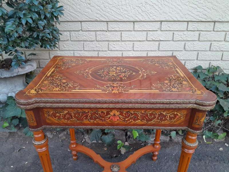 A 20th Century French Style Walnut and Gilt Metal  Games Table with Tooled Leather Top