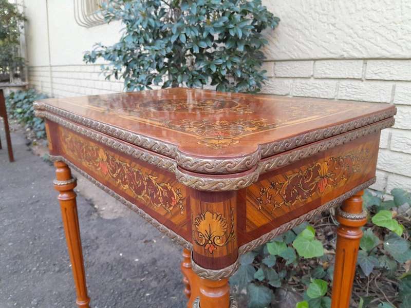 A 20th Century French Style Walnut and Gilt Metal  Games Table with Tooled Leather Top