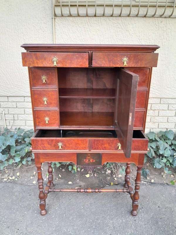 A 20th Century Burr-Walnut Chest on Stand