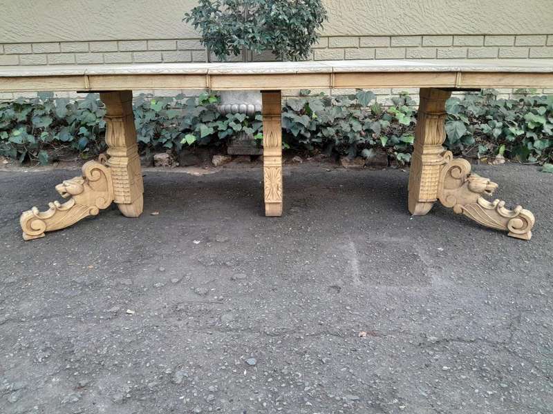 A 19th Century Heavily Carved Oak Extending Table  With Three Extensions