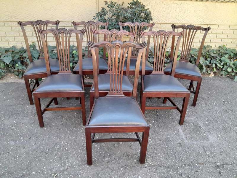 A 20th Century Set Of  Eight Carved Mahogany George Lll Style Dining Chairs Upholstered In Leather