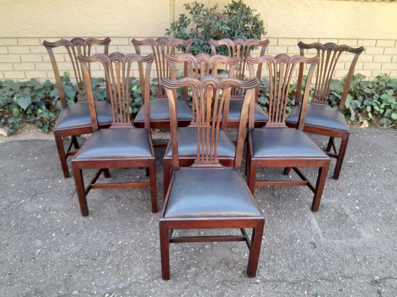 A 20th Century Set Of  Eight Carved Mahogany George Lll Style Dining Chairs Upholstered In Leather