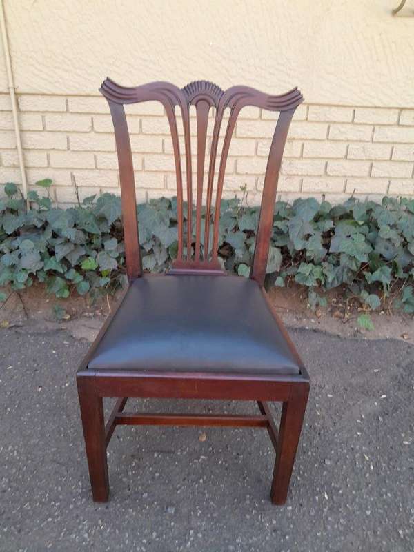 A 20th Century Set Of  Eight Carved Mahogany George Lll Style Dining Chairs Upholstered In Leather