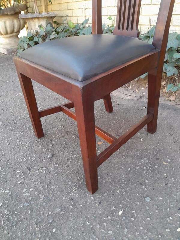 A 20th Century Set Of  Eight Carved Mahogany George Lll Style Dining Chairs Upholstered In Leather