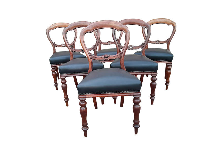 An Antique Set Of Six Victorian Carved Walnut Dining Chairs Upholstered In Leather
