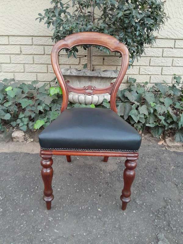 An Antique Set Of Six Victorian Carved Walnut Dining Chairs Upholstered In Leather