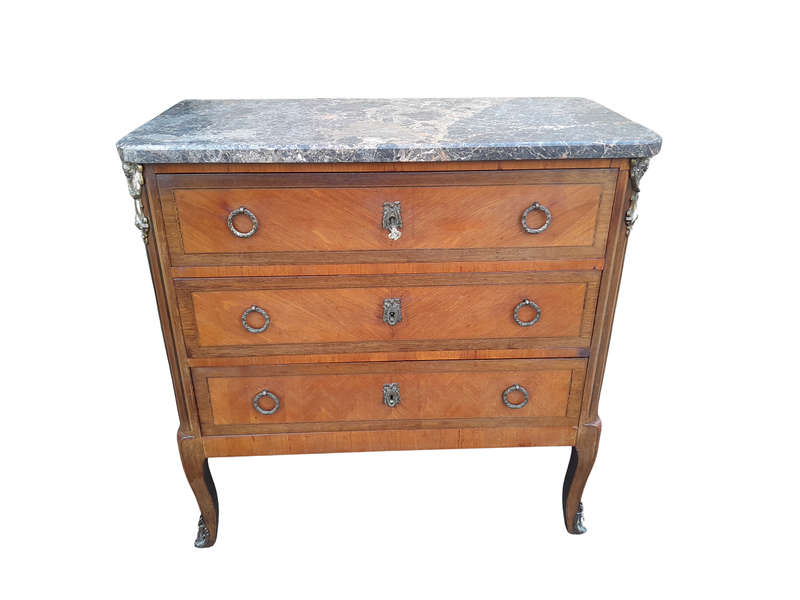 An Antique Kingswood and Gilt Metal Mounted Chest of Drawers with Marble Top