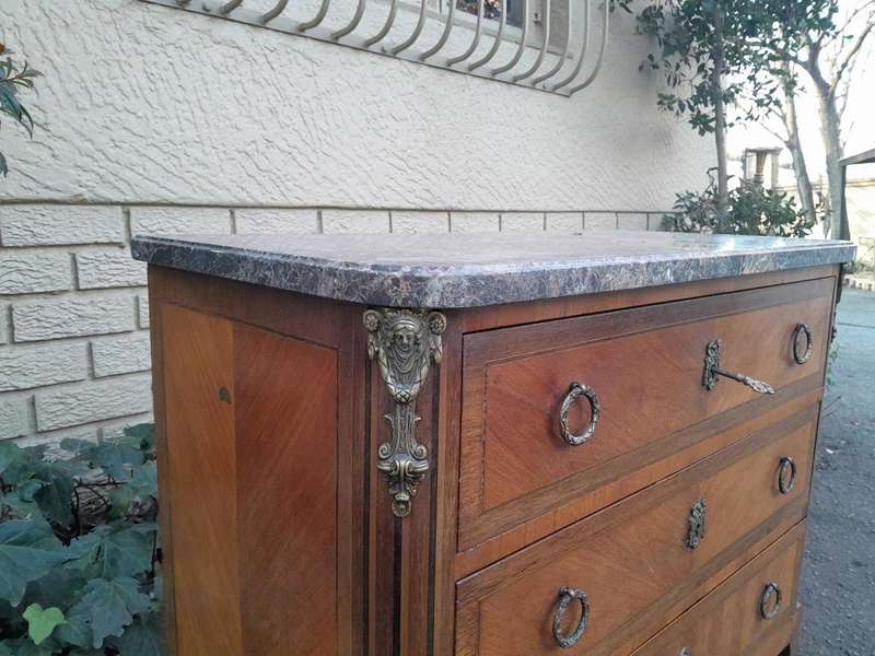 An Antique Kingswood and Gilt Metal Mounted Chest of Drawers with Marble Top