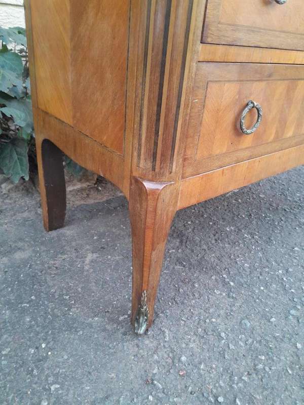 An Antique Kingswood and Gilt Metal Mounted Chest of Drawers with Marble Top