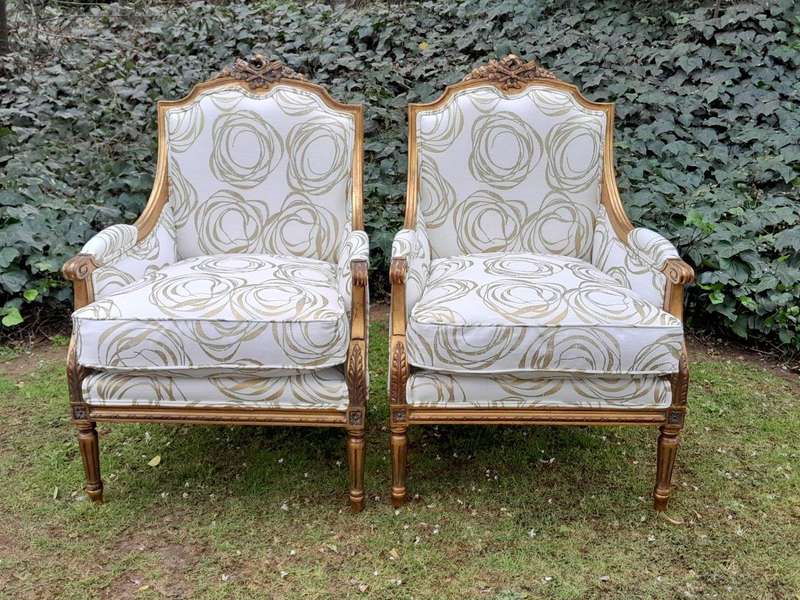 A 20th Century French Style Giltwood Armchairs