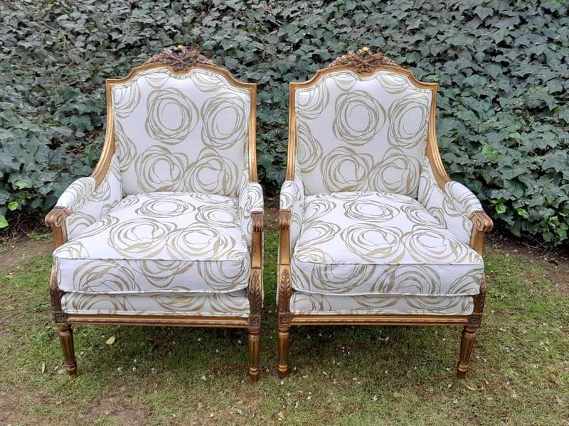 A 20th Century French Style Giltwood Armchairs
