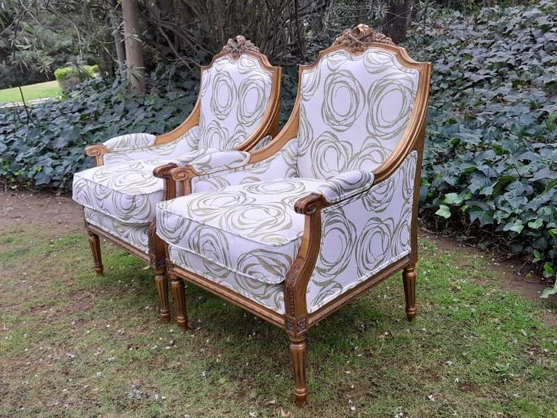 A 20th Century French Style Giltwood Armchairs