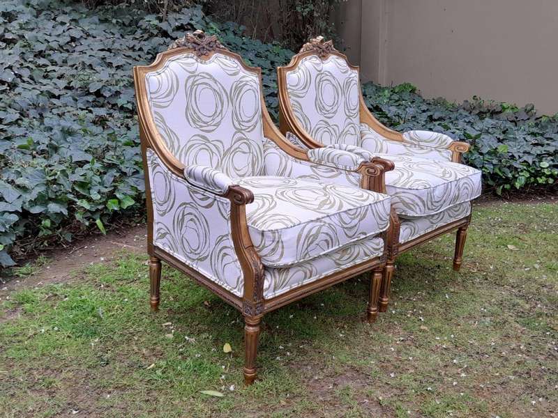 A 20th Century French Style Giltwood Armchairs