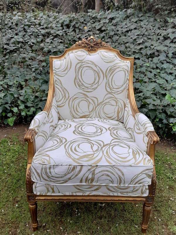 A 20th Century French Style Giltwood Armchairs