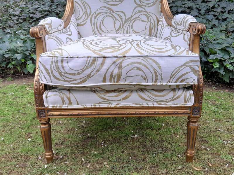 A 20th Century French Style Giltwood Armchairs