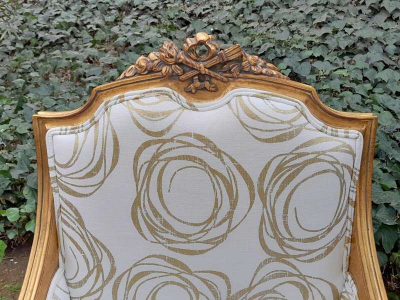 A 20th Century French Style Giltwood Armchairs