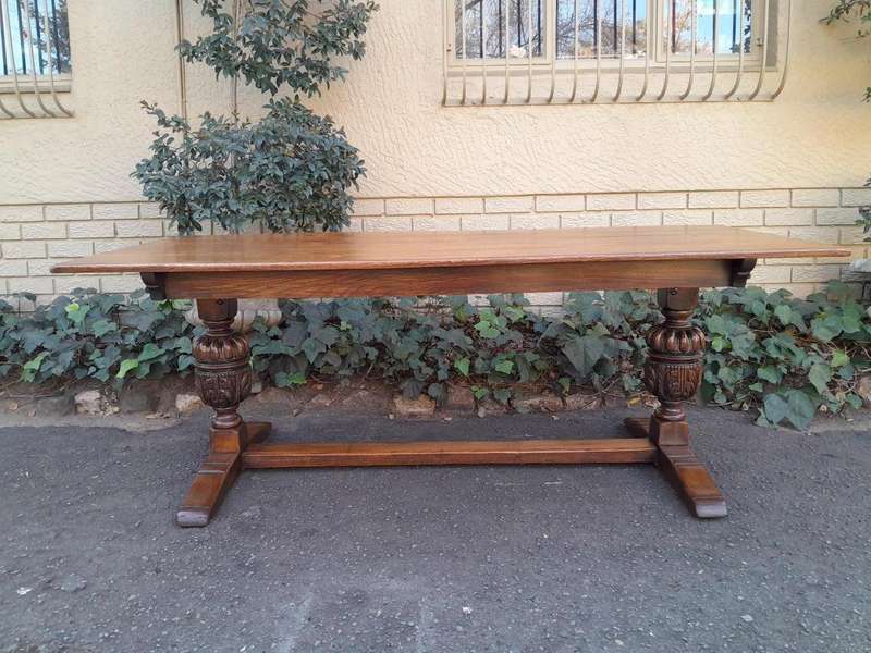 A 19th Century Circa 1900 Heavily Carved Oak Refectory Table