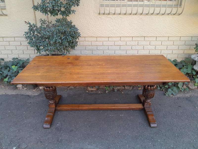 A 19th Century Circa 1900 Heavily Carved Oak Refectory Table