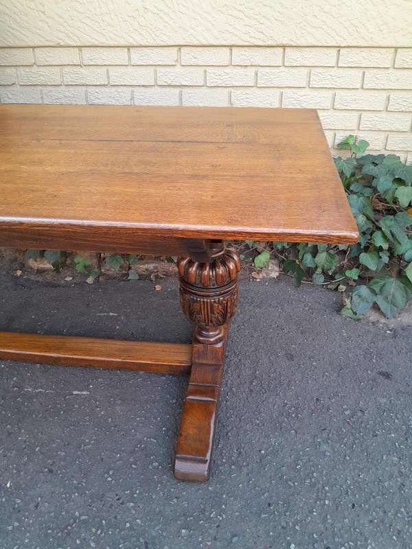 A 19th Century Circa 1900 Heavily Carved Oak Refectory Table