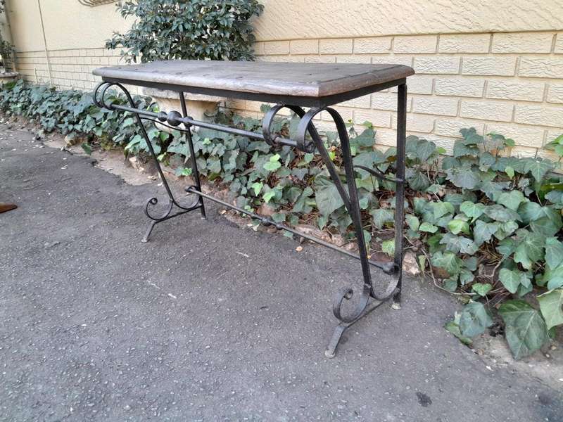 A 20th Century Wrought Iron and Hardwood Top Console Table