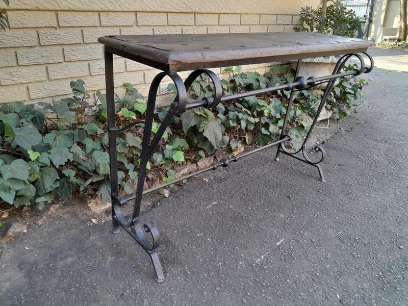 A 20th Century Wrought Iron and Hardwood Top Console Table