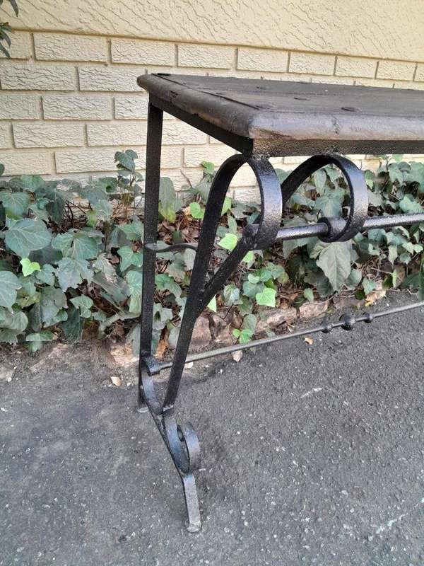 A 20th Century Wrought Iron and Hardwood Top Console Table