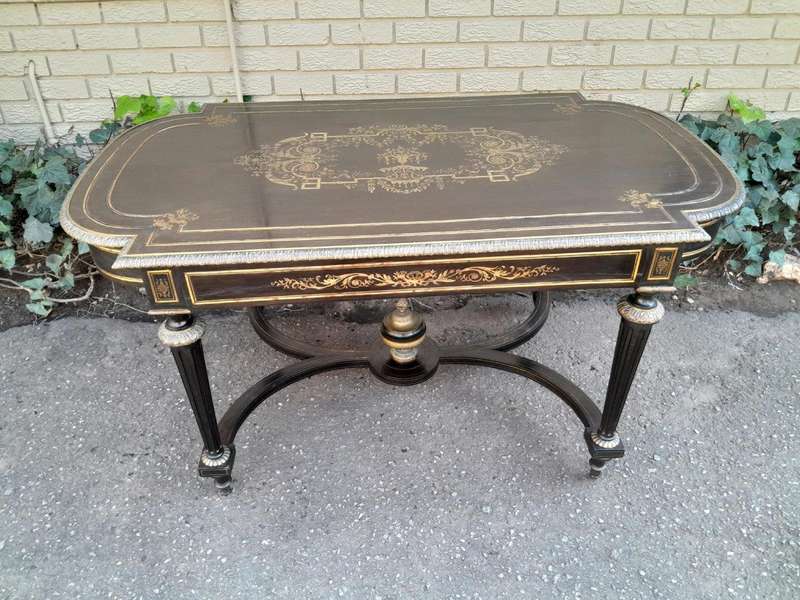 A 19th Century French Ebonised and Brass inlay and Metal Mounted Table with Drawer