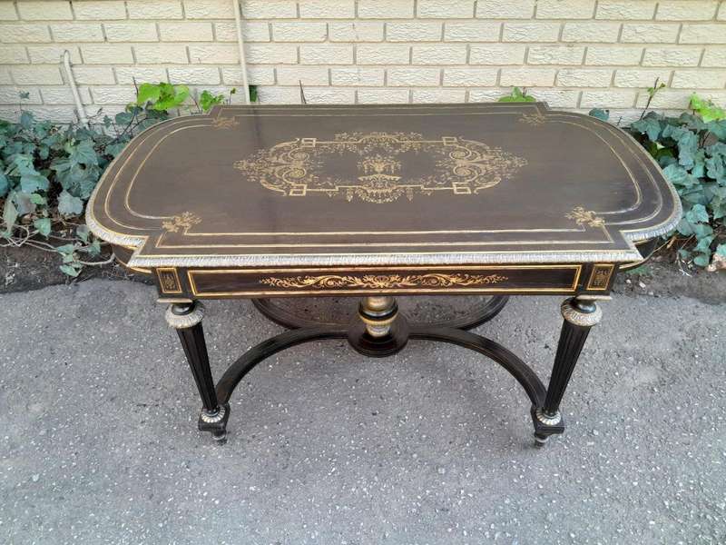 A 19th Century French Ebonised and Brass inlay and Metal Mounted Table with Drawer