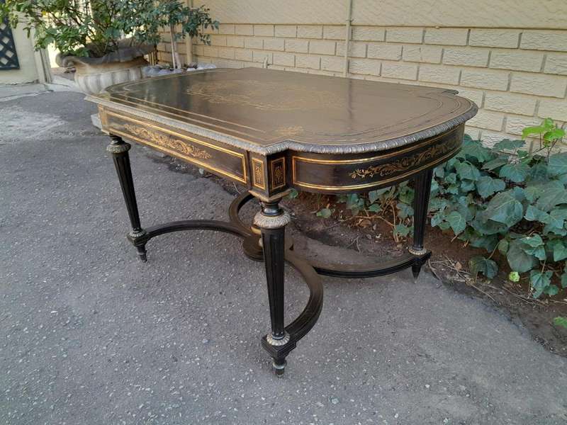 A 19th Century French Ebonised and Brass inlay and Metal Mounted Table with Drawer