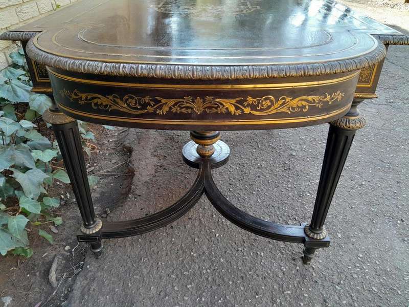 A 19th Century French Ebonised and Brass inlay and Metal Mounted Table with Drawer