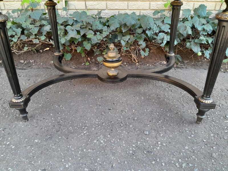 A 19th Century French Ebonised and Brass inlay and Metal Mounted Table with Drawer
