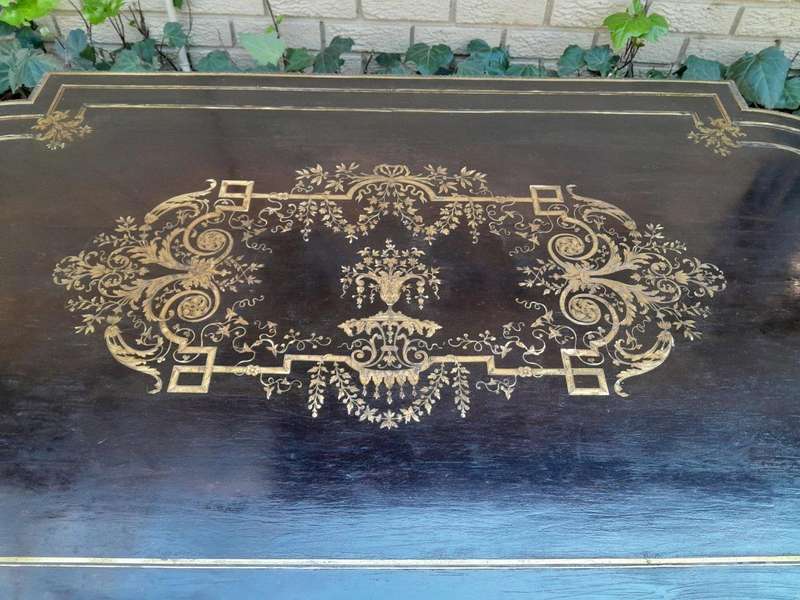 A 19th Century French Ebonised and Brass inlay and Metal Mounted Table with Drawer
