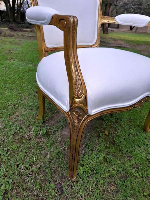A 20th Century Circa 1920 Pair Of French Carved Giltwood Armchairs