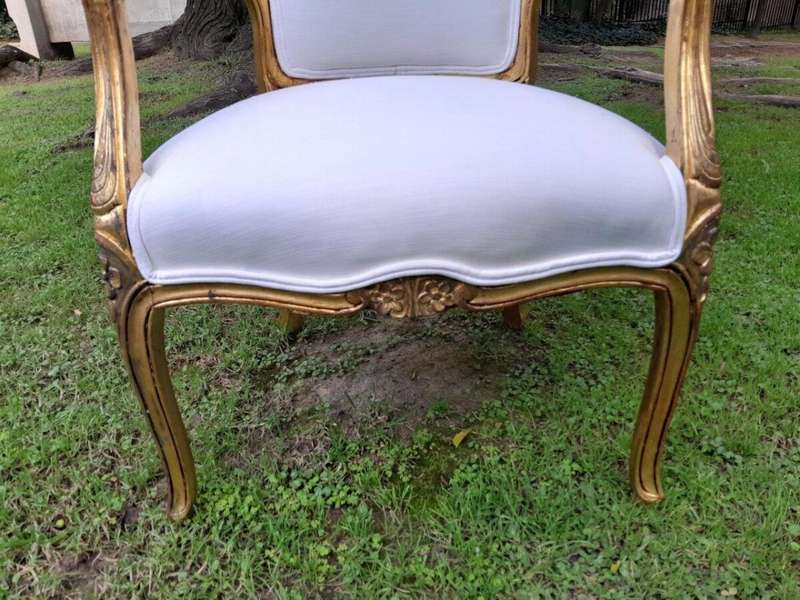 A 20th Century Circa 1920 Pair Of French Carved Giltwood Armchairs