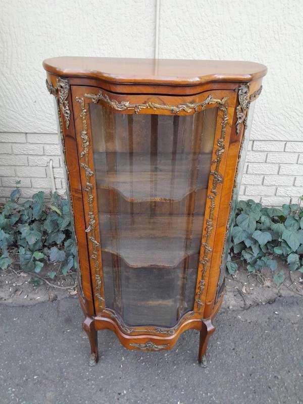 A 20th Century French Mahogany Vitrine With Gilded Metal Embellishments