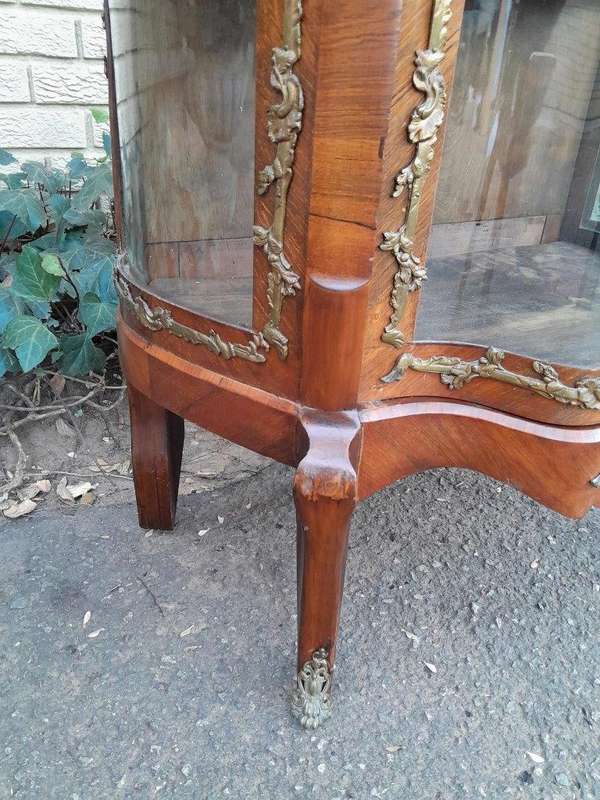 A 20th Century French Mahogany Vitrine With Gilded Metal Embellishments