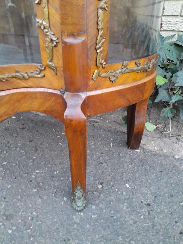 A 20th Century French Mahogany Vitrine With Gilded Metal Embellishments