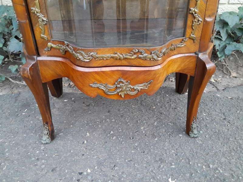 A 20th Century French Mahogany Vitrine With Gilded Metal Embellishments