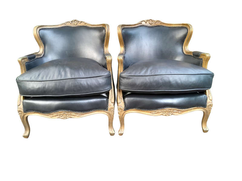 A 20th Century Pair of French Style Carved Giltwood Armchairs Upholstered in Leather