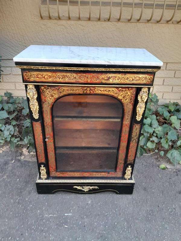 An Antique 19thcentury French Boulle, Ormolu And Ebonised Cabinet