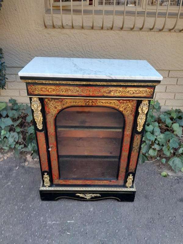An Antique 19thcentury French Boulle, Ormolu And Ebonised Cabinet