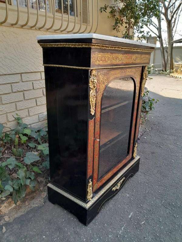 An Antique 19thcentury French Boulle, Ormolu And Ebonised Cabinet