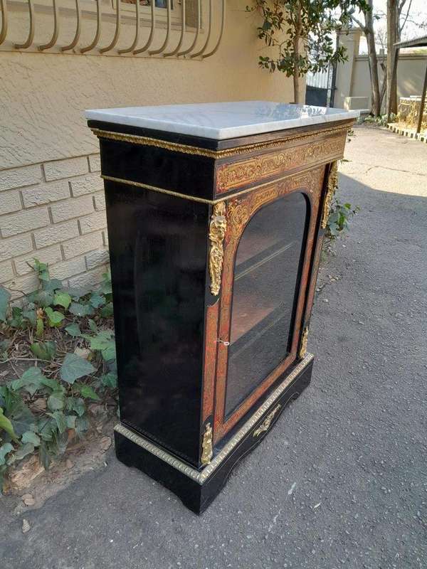 An Antique 19thcentury French Boulle, Ormolu And Ebonised Cabinet