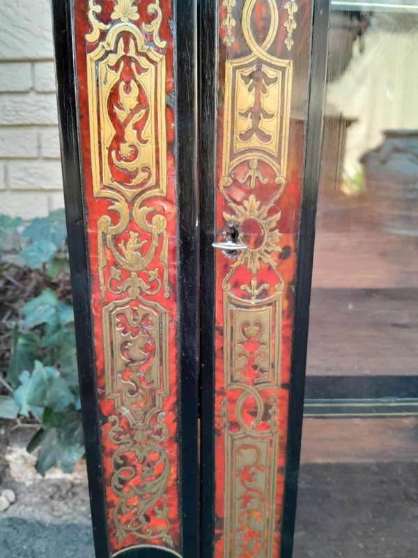 An Antique 19thcentury French Boulle, Ormolu And Ebonised Cabinet