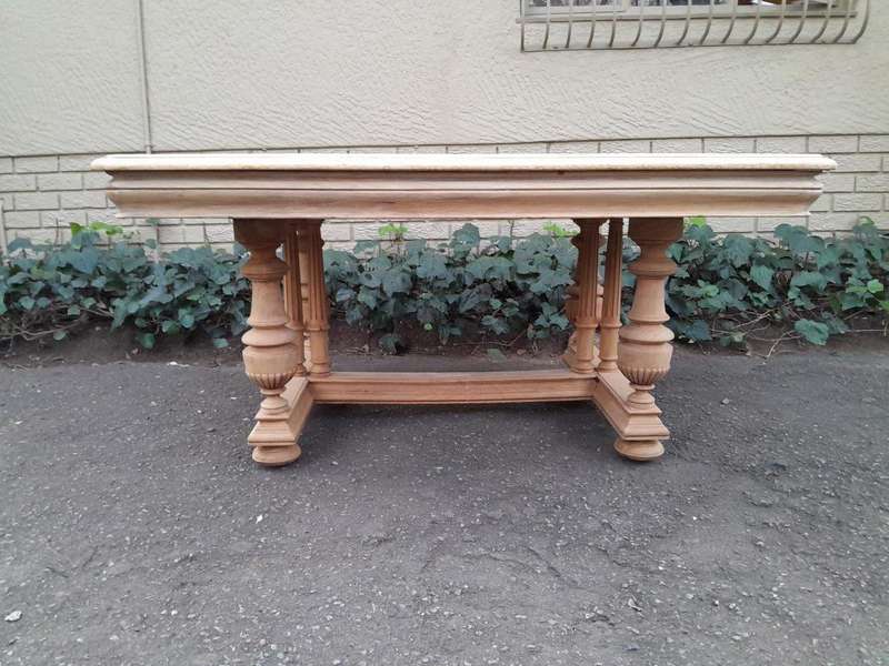 A 19th Century French Heavily Carved Walnut Table in a Contemporary Bleached Finish